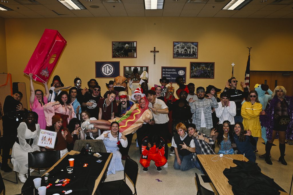 College students at a Catholic Halloween party in costumes