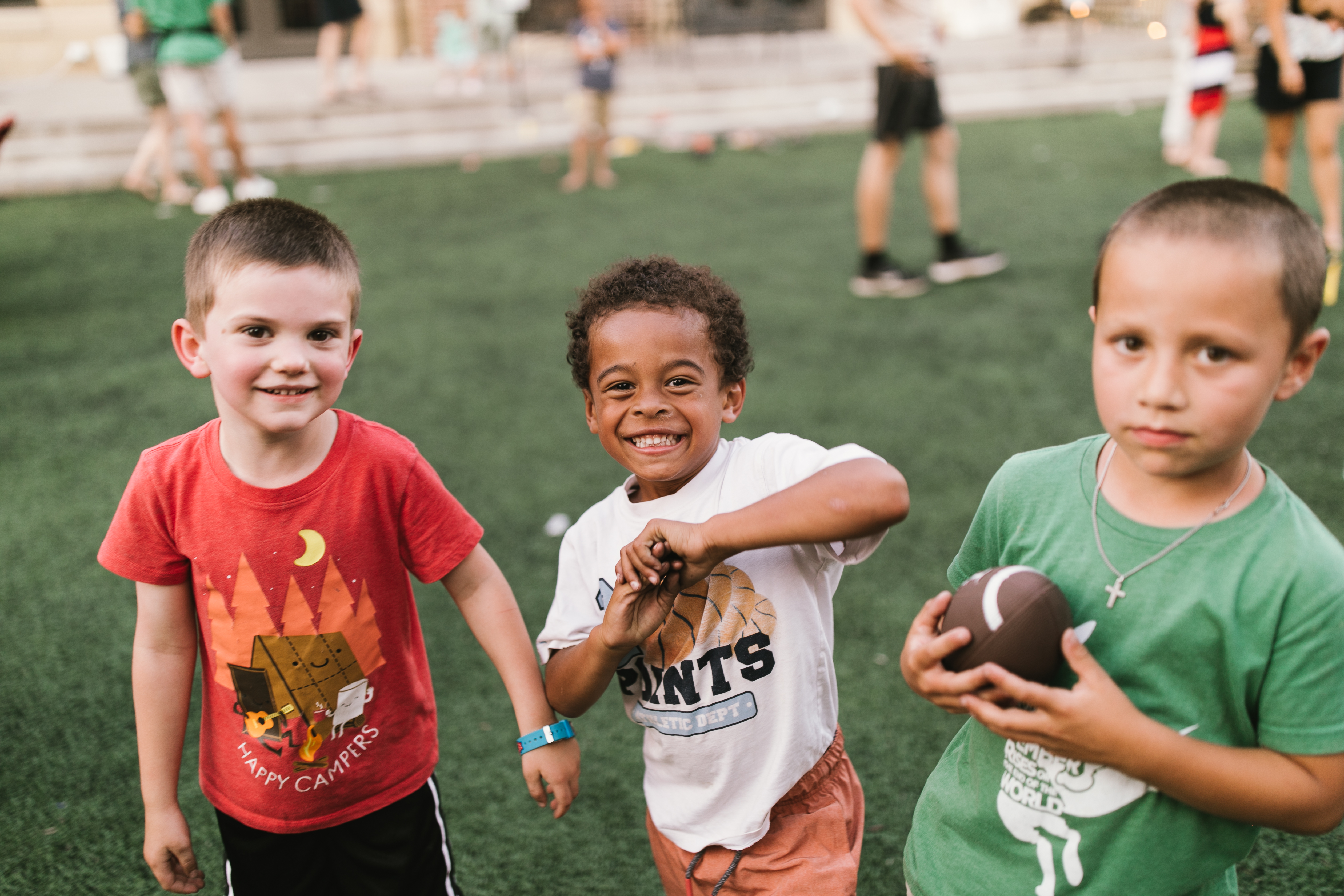 Kids playing at a parish event. Catholic New Years Resolutions - teach children.