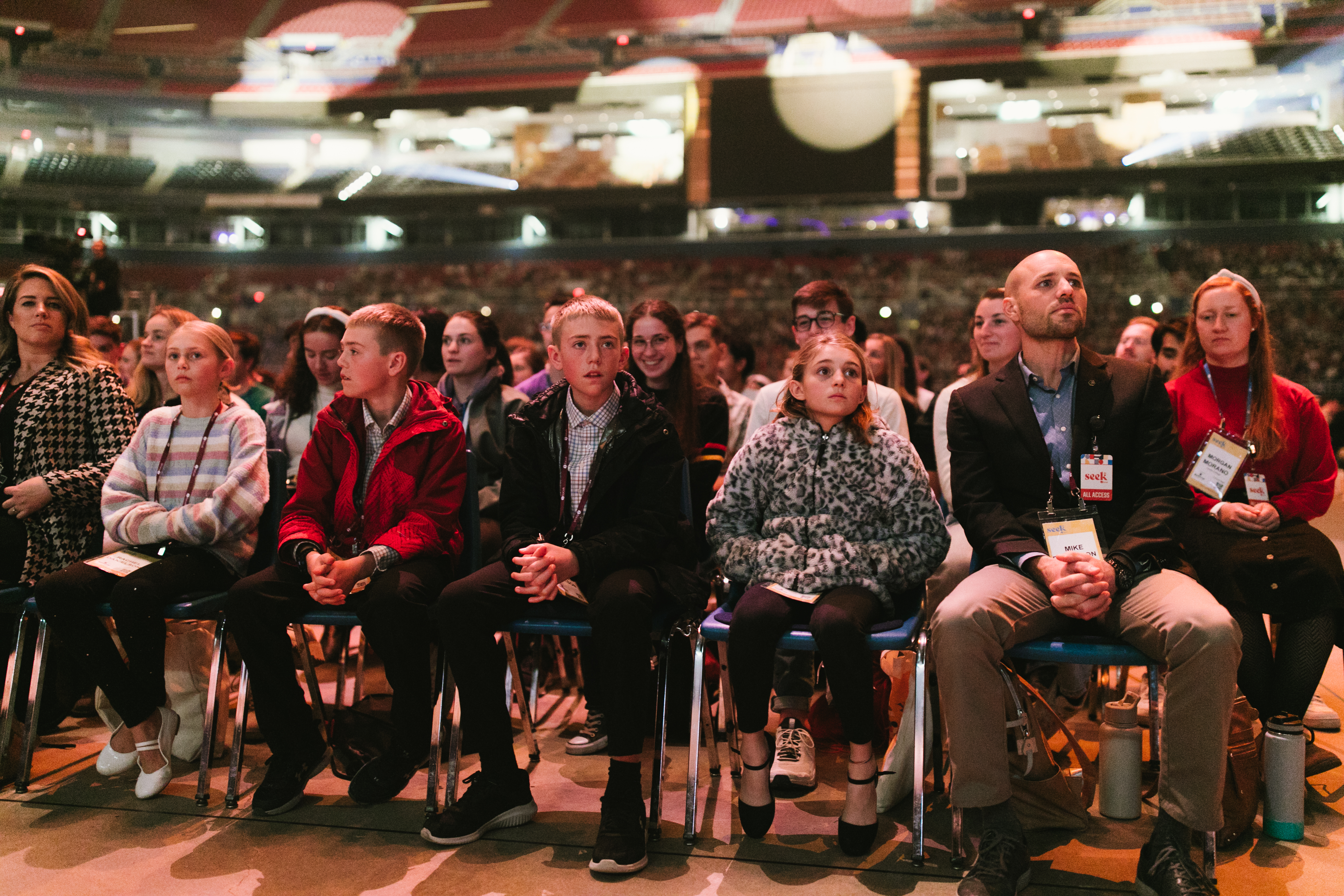 A family attends the FOCUS SEEK conference via the Making Missionary Disciples track