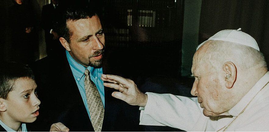 John Paul II Blessing Two People