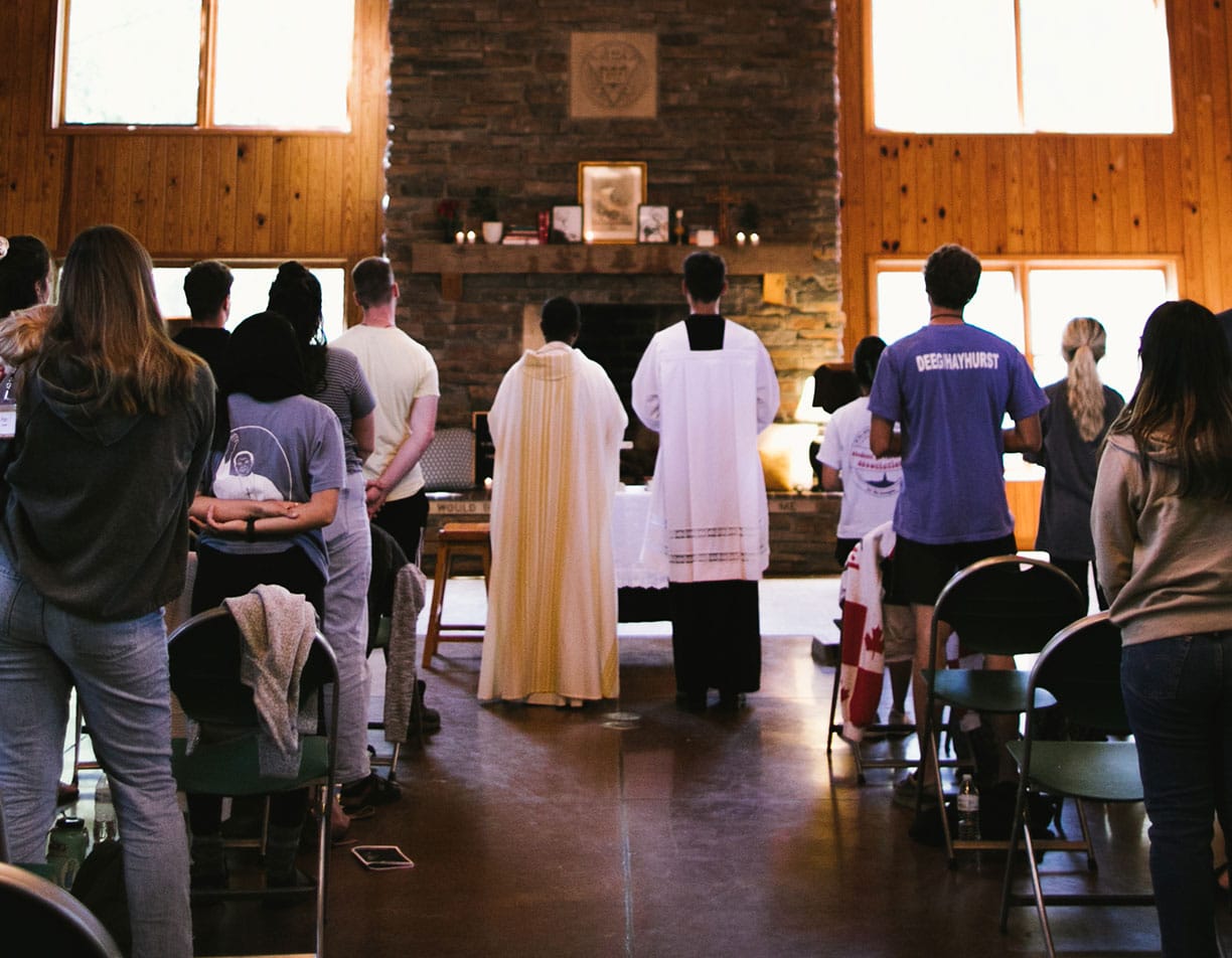 retreat attendees celebrating mass